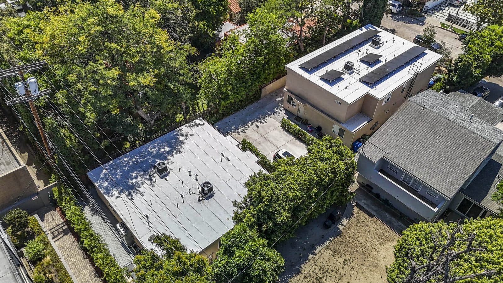 Detached rear ADU building and driveway