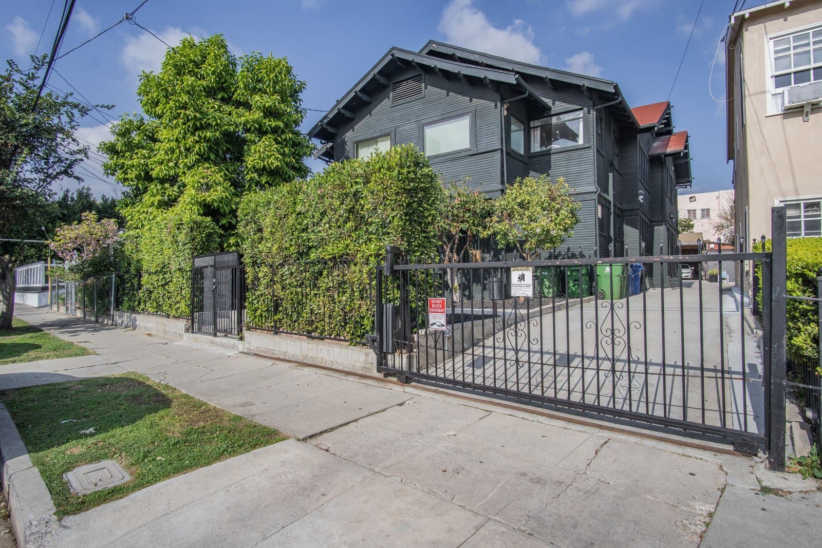 Gated pedestrian entry and street frontage on Montana Street