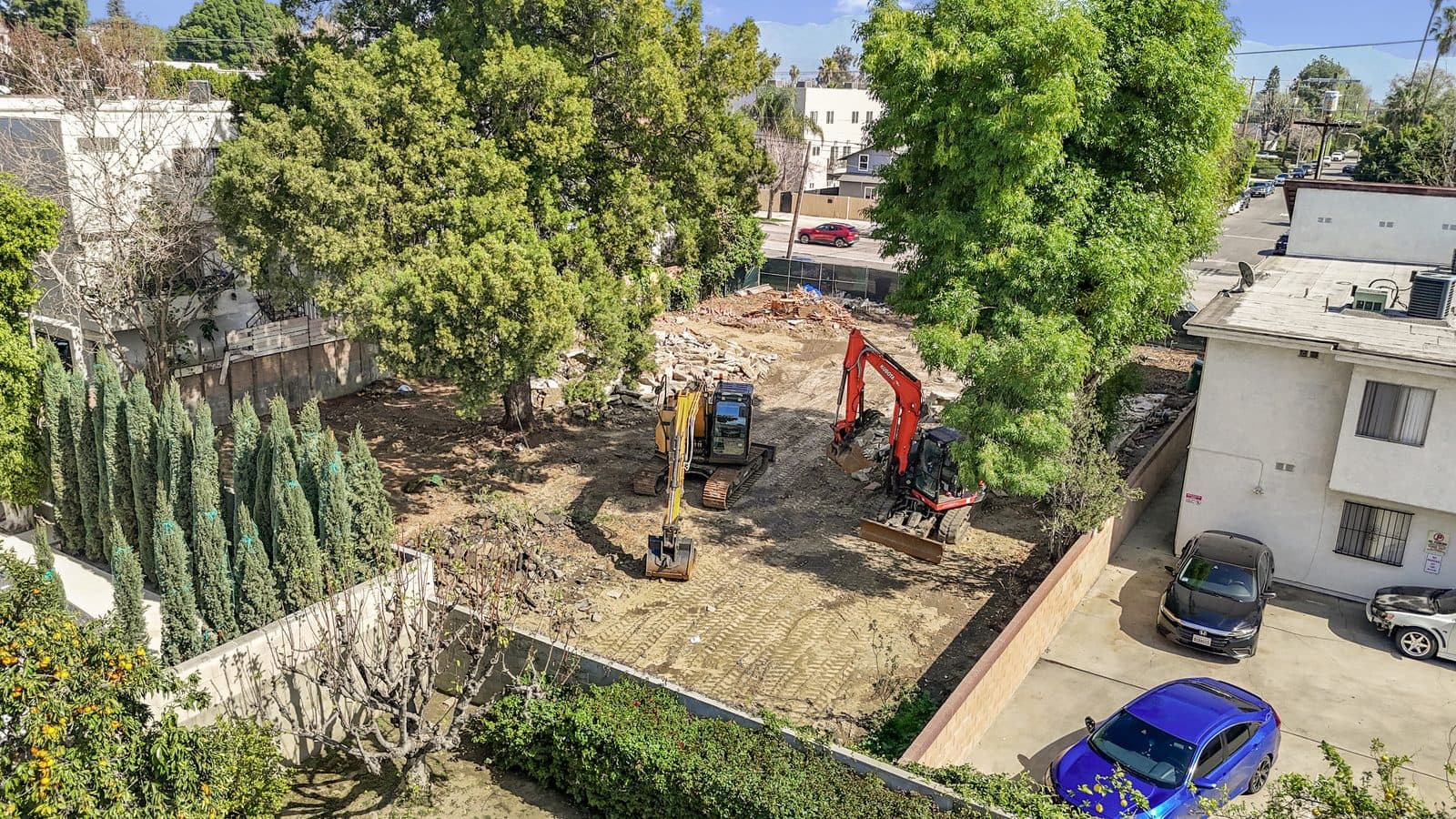 Aerial of the cleared 10,005 SF site with demolition underway